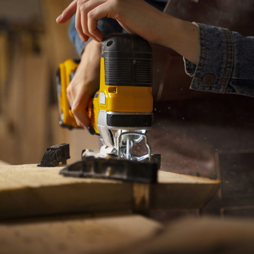 side-view-artisan-using-wood-tool