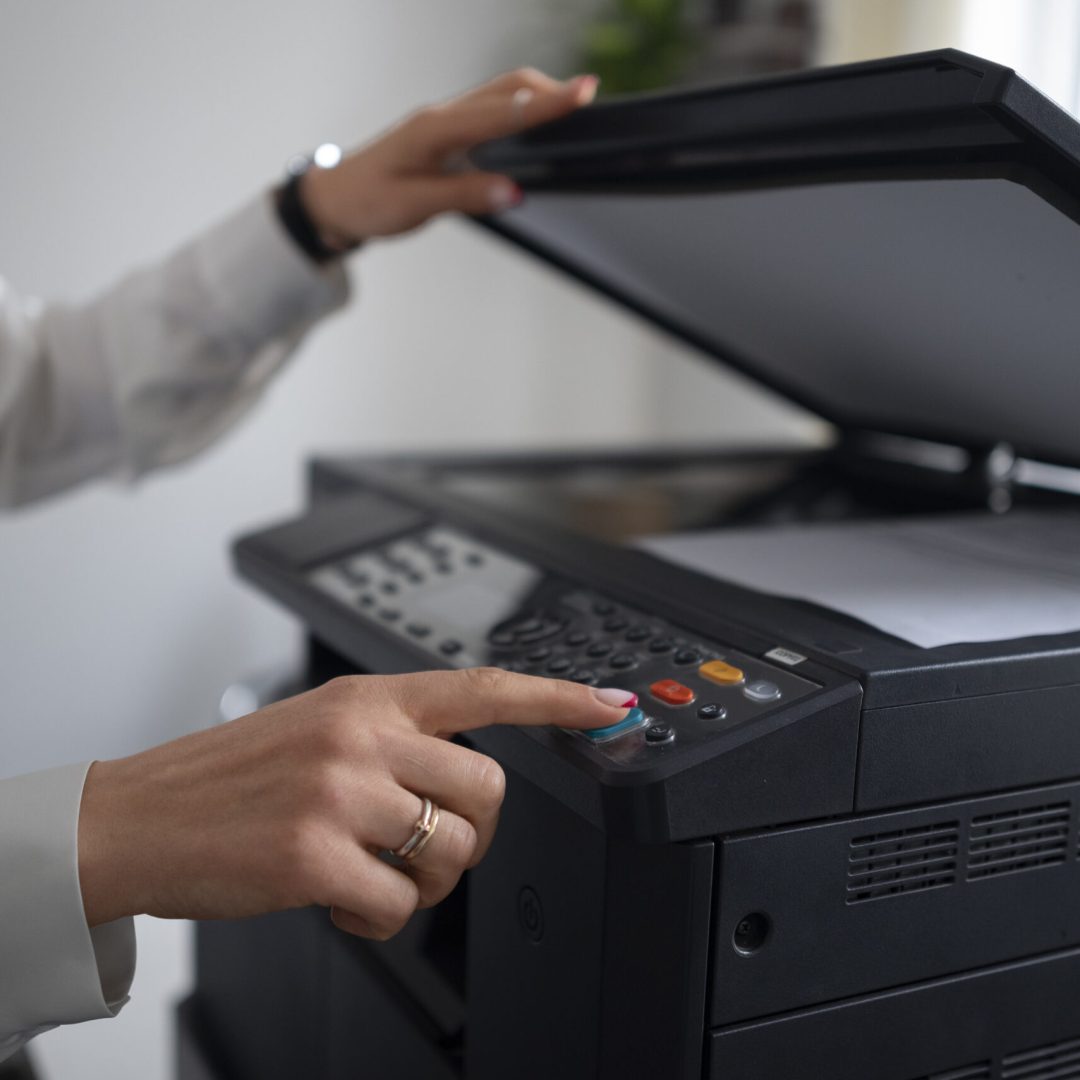 woman-work-office-using-printer